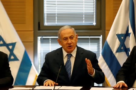 Israeli Prime Minister Benjamin Netanyahu delivers a statement to the media at the start of his Likud party faction meeting at the Knesset, Israel's parliament, in Jerusalem