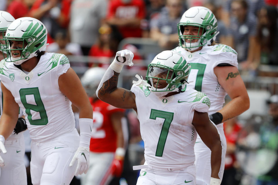 Sep 11, 2021; Columbus, Ohio, USA; Oregon Ducks running back CJ Verdell (7)celebrates his touchdown run during the second quarter against the Ohio State Buckeyes at Ohio Stadium. Mandatory Credit: Joseph Maiorana-USA TODAY Sports