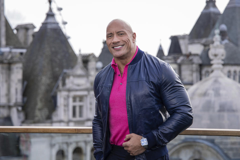 FILE - Dwayne Johnson poses for photographers during a photo call to promote the film "Black Adam" in London, Monday, Oct. 17, 2022. Johnson turns 51 on May 2. (Photo by Vianney Le Caer/Invision/AP, File)