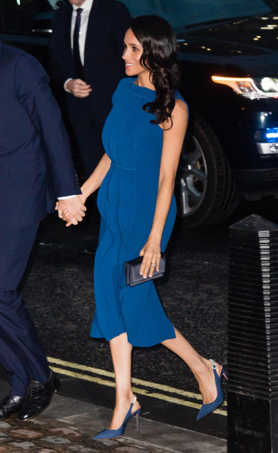 The Duchess of Sussex opted for a royal blue shift dress by Jason Wu for the prestigious evening of music. Photo: Getty