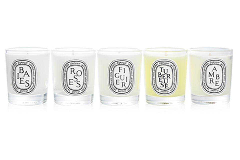 A photo of DIPTYQUE - Scented Candles Set - Berries, Roses, Fig Tree, Tuberose, Amber.