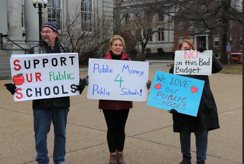 Advocates for school funding gathered outside the NH State House on April 6, 2023, as House members prepared to vote on the state budget.