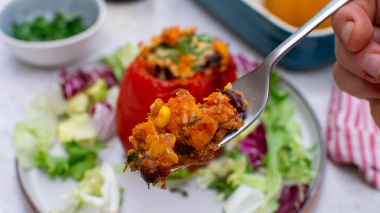 enchilada-stuffed peppers with fork