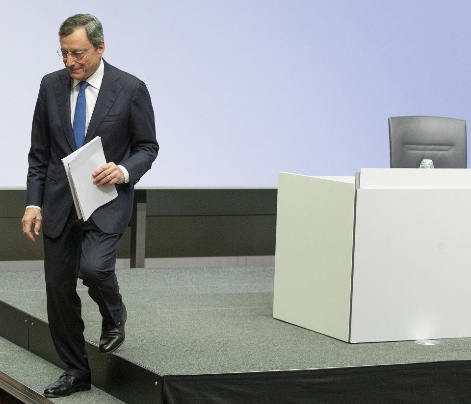 President of European Central Bank Mario Draghi leaves the podium after a press conference after chairing his last policy meeting in Frankfurt, Germany, Thursday, Oct. 24, 2019. (AP Photo/Michael Probst)