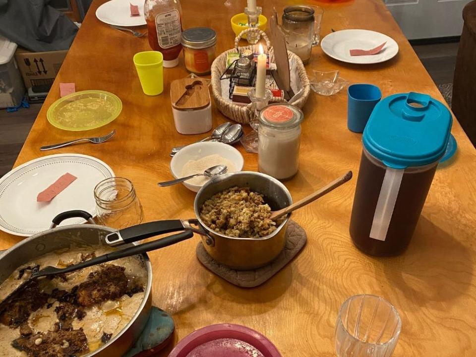 kitchen table set up for a big dinner at the tanner's house