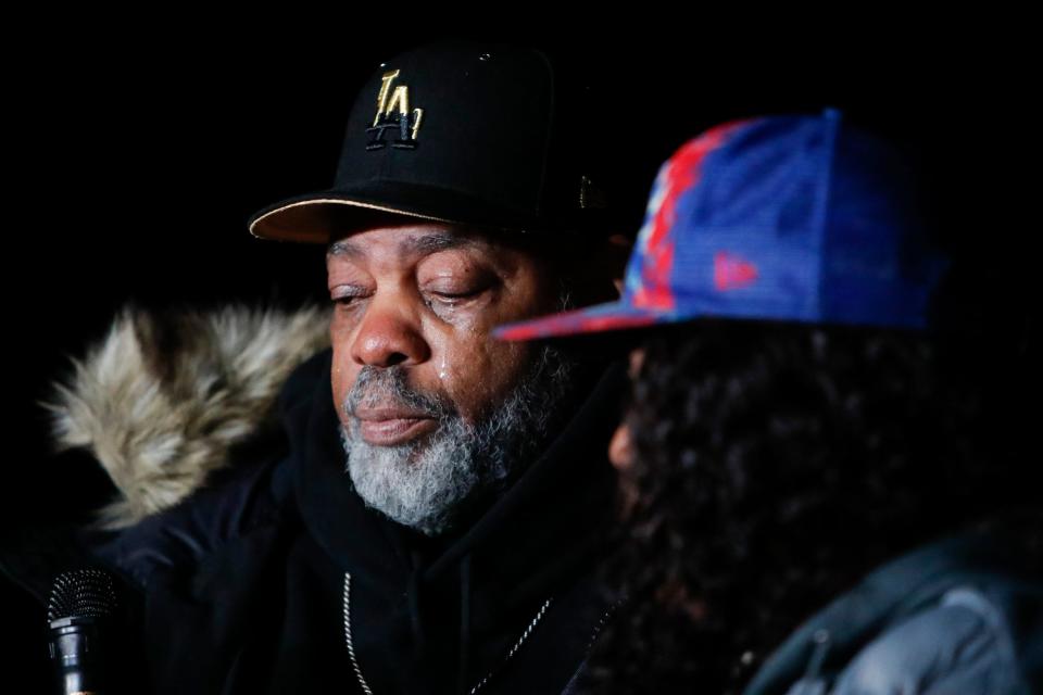 Tears roll down the cheeks of Rodney Wells, the father of Tyre Nichols, as RowVaughn Wells, Nichols’ mother, finishes speaking at a candlelight vigil for Nichols held at the site where he was beaten to death by Memphis Police Department officers on the one year anniversary of his death in Memphis, Tenn., on Sunday, January 7, 2024.