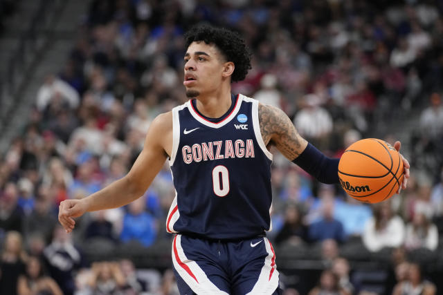 Gonzaga's Julian Strawther (0) handles the ball in the first half of a Sweet 16 college basketball game against UCLA in the West Regional of the NCAA Tournament, Thursday, March 23, 2023, in Las Vegas. (AP Photo/John Locher)