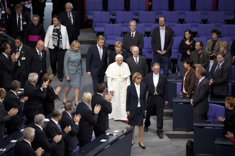 FILE - Pope Benedict XVI arrives for his speech at the German parliament Bundestag in Berlin, Germany, Sept. 22, 2011. Some lawmakers of the Left Party refused to attend the speech in the parliament and their seats remained empty. Pope Benedict XVI leaves his homeland with a complicated legacy: pride in a German pontiff but a church deeply divided over the need for reforms in the wake of a sexual abuse scandal in which his own actions of decades ago were faulted. (AP Photo/Markus Schreiber, File)