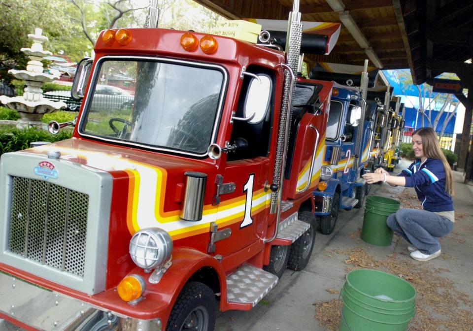 The Big Rigs get a wash from Waldameer Park & Water World ride operator Alka Kardos in this 2006 file photo. The ride opened in 1999.