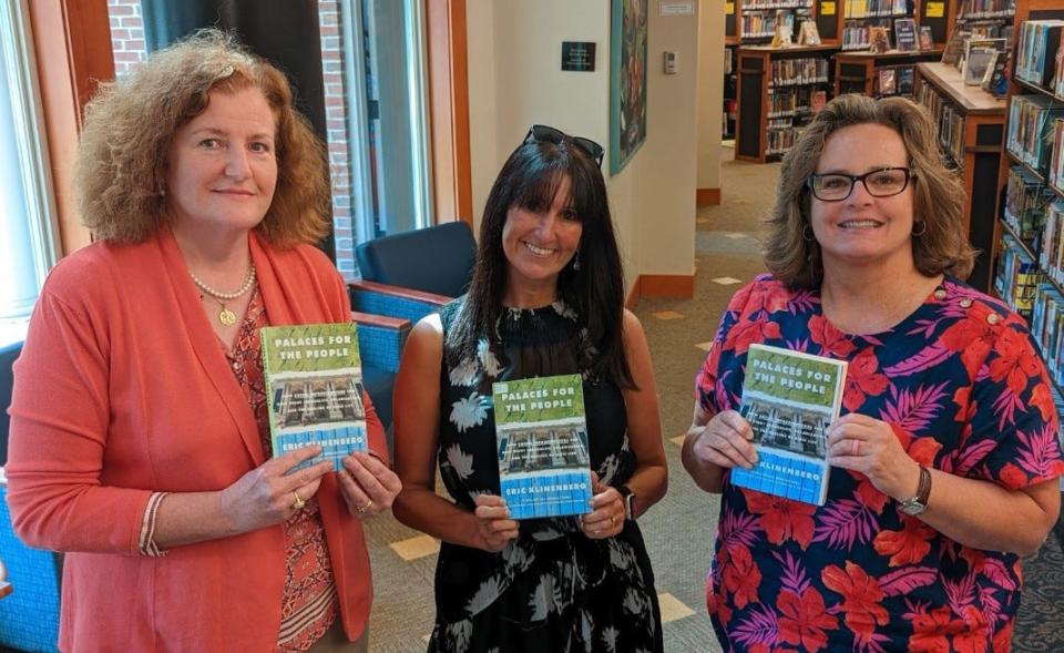 From left to right are Kerry Cronin, director of the Newmarket Public Library, Hayley Van-Gils, director of the Lee Public Library and Sheryl Bass, director of the Durham Public Library holding the Community Reads book choice.