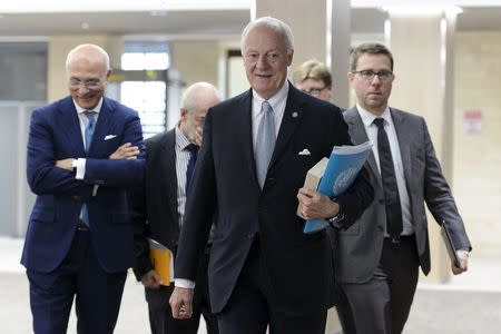 U.N. mediator on Syria Staffan de Mistura (C) arrives for a meeting with the Syrian government delegation during Syria peace talks at the United Nations in Geneva, Switzerland, April 15, 2016.REUTERS/Fabrice Coffrini/Pool