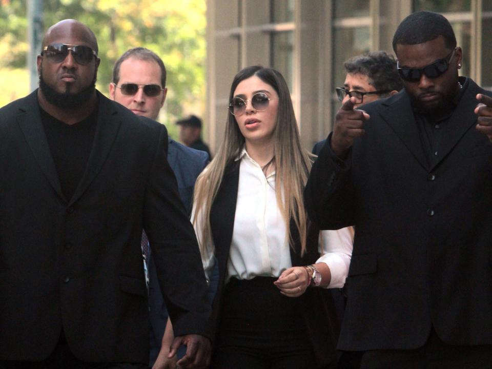 Emma Coronel, Joaquín Guzmán's wife, leaves court after Guzmán's sentencing in July 2019.