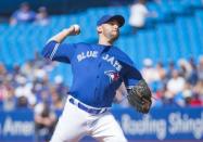 Jun 16, 2018; Toronto, Ontario, CAN; Toronto Blue Jays starting pitcher Marco Estrada (25) throws a pitch during the first inning against the Washington Nationals at Rogers Centre. Mandatory Credit: Nick Turchiaro-USA TODAY Sports