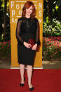 Christina Hendricks arrives at the Hollywood Foreign Press Association's 2012 Luncheon held at the Beverly Hill Hotel on August 9, 2012.