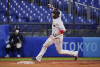 Japan's Tetsuto Yamada advances to third after stealing second during the ninth inning of a baseball game against the United States at the 2020 Summer Olympics, Monday, Aug. 2, 2021, in Yokohama, Japan. (AP Photo/Sue Ogrocki)