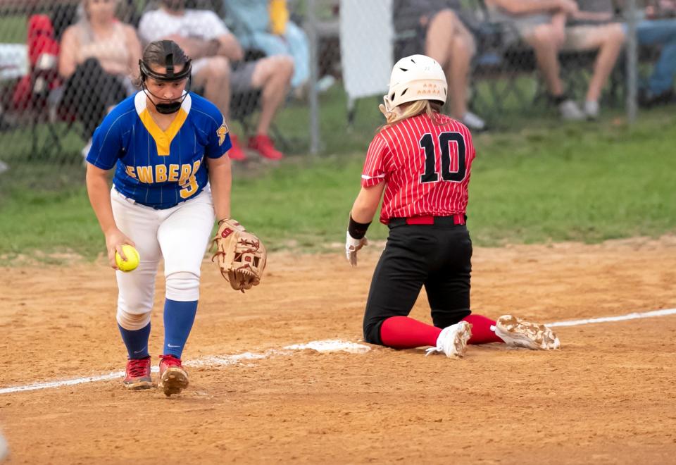 Newberry third baseman Hollie Pabst (3) tried for the out on Williston Brooklyn Bertrand (10) at third as Newberry takes on Williston in Class 1A state softball playoffs at Williston High School in Williston, FL on Thursday, May 11, 2023. Williston won 15-0 and the game was ended after four innings. [Alan Youngblood/Gainesville Sun]