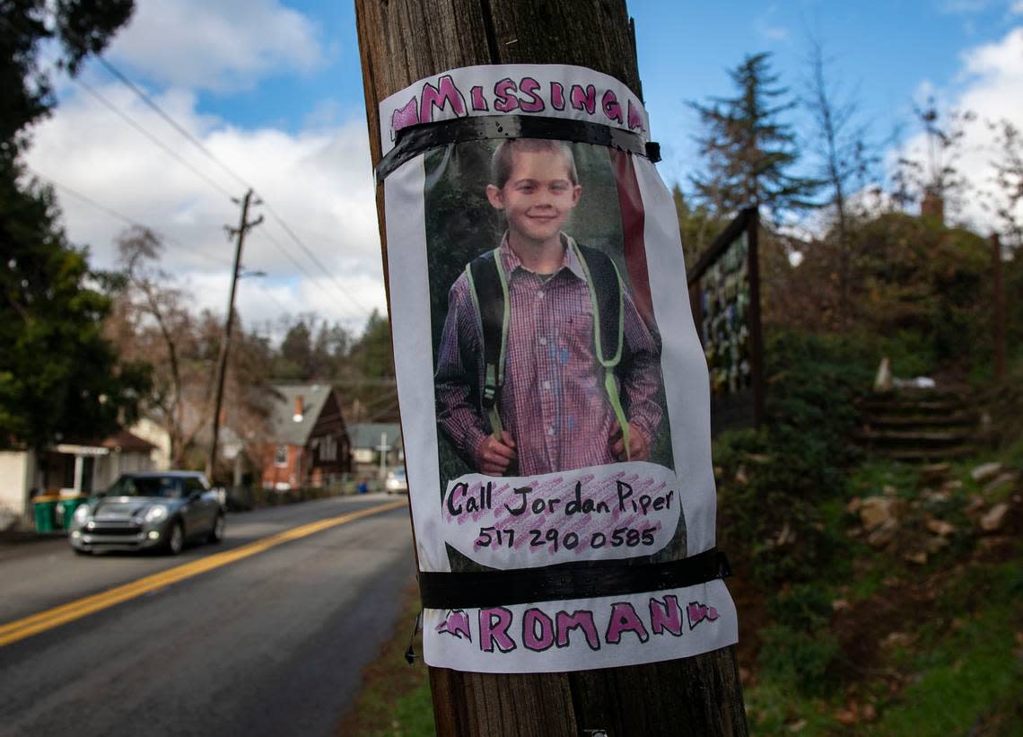 A missing sign is posted on a telephone pole Monday, Jan. 13, 2020, near the home of Roman Anthony Lopez, an 11-year-old Placerville boy who went missing on Jan. 11, 2020, and was later found dead in the basement of his home on Coloma Street in Placerville.