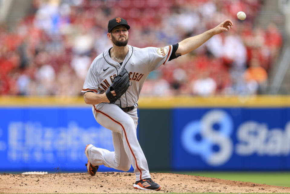 San Francisco Giants' Alex Wood throws during the first inning of a baseball game against the Cincinnati Reds in Cincinnati, Saturday, May 28, 2022. (AP Photo/Aaron Doster)