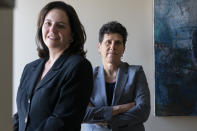 In this May 21, 2021, photo Washington based civil rights attorneys Lisa Banks, left, and Debra Katz, pose for a portrait at their law firm in Washington. For many people, the pandemic year has brought a pause of some kind, or at least a slowdown, to their professional endeavors. For Katz and Banks, the opposite has been true. “This is probably the biggest year we’ve ever had,” says Banks. Their work has been increasing for nearly four years. When the Harvey Weinstein revelations erupted in October 2017, launching the reckoning that became known as the #MeToo movement, it caused “a sea change," Katz says. (AP Photo/Jacquelyn Martin)