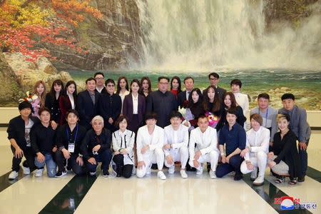 North Korean leader Kim Jong Un poses with South Korean K-pop singers in this photo released by North Korea's Korean Central News Agency (KCNA) in Pyongyang April 2, 2018. KCNA/via Reuters
