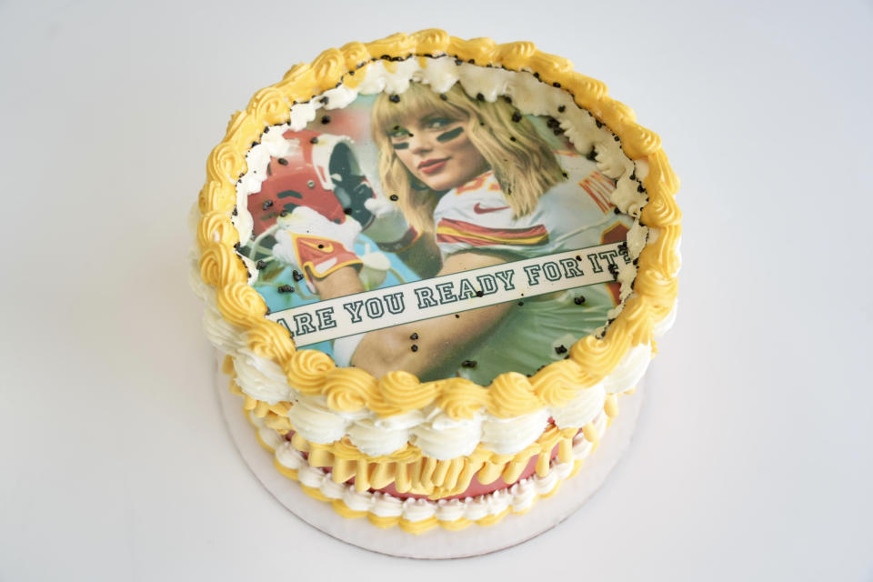 A Taylor Swift-themed "burn away cake" is displayed in Coon Rapids, Minn., Monday, Feb. 5, 2024. Maddie Schmitz, owner of Something Sweet by Maddie Lu, created the Swift/Travis Kelce cakes just in time for NFL football's upcoming Super Bowl. (AP Photo/Mark Vancleave)