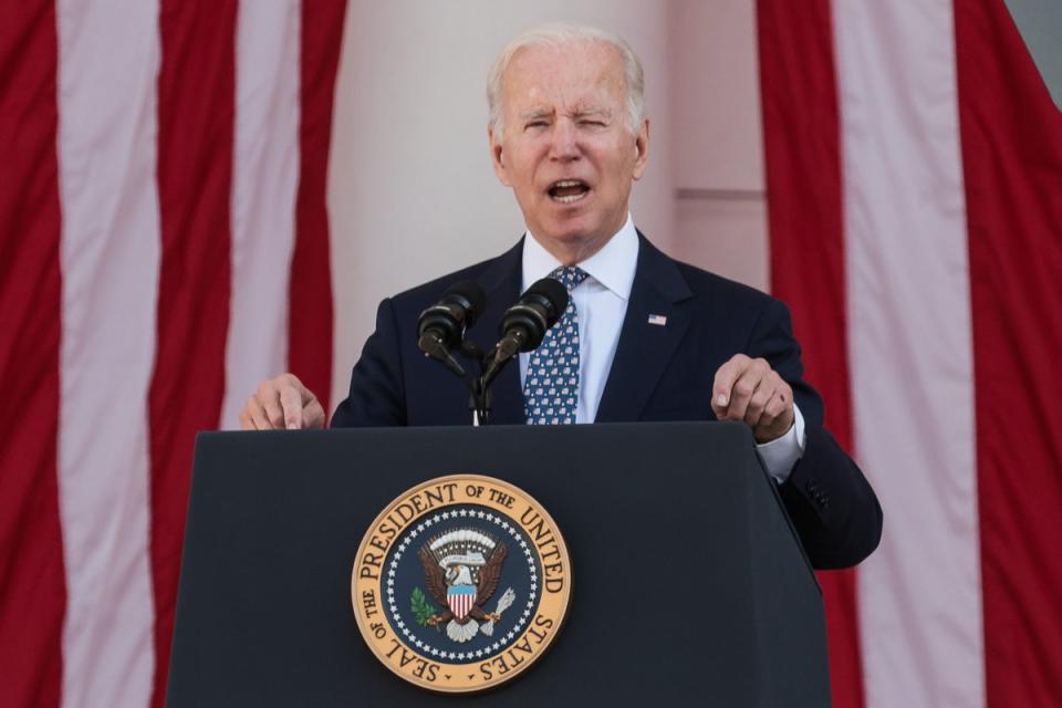 President Joe Biden speaking at Arlington National Cemetery on Veterans Day where he vowed that veterans suffering from exposure to burn pits would have their healthcare covered (EPA)