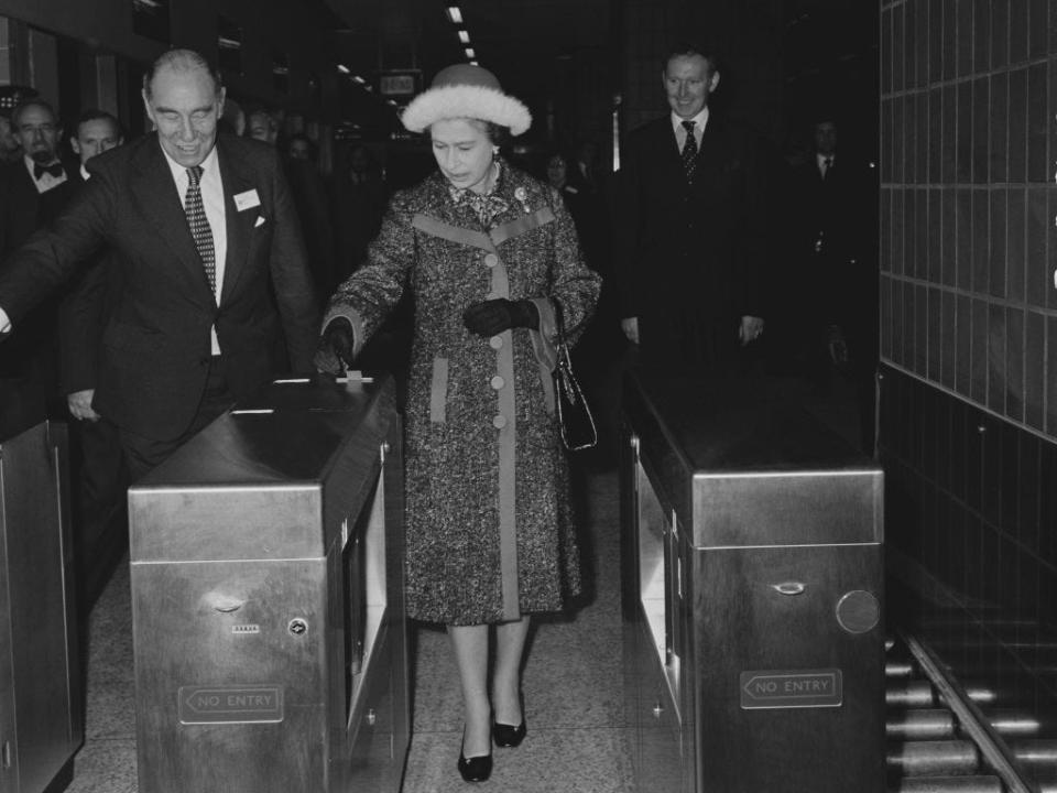 Queen Elizabeth takes the tube in 1977.