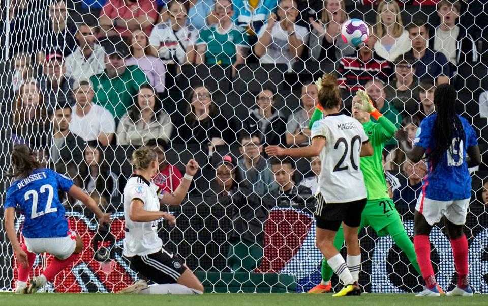 Germany's Alexandra Popp, 2nd left, scores the opening goal - AP images