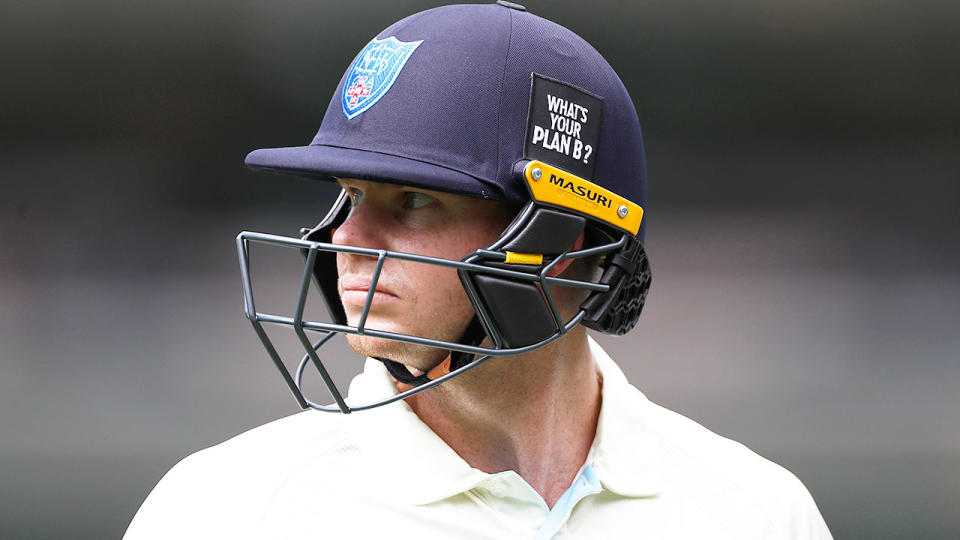 Seen here, Steve Smith looks angry about a decision in the Sheffield Shield match against Victoria.