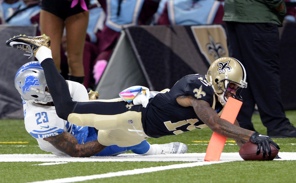 <p>New Orleans Saints wide receiver Ted Ginn (19) breaks past Detroit Lions cornerback Darius Slay on a touchdown reception in the first half of an NFL football game in New Orleans, Sunday, Oct. 15, 2017. (AP Photo/Bill Feig) </p>