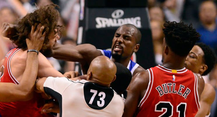 Toronto Raptors forward Serge Ibaka (9) lands a strike on Chicago Bulls center Robin Lopez (8). (Frank Gunn/CP)