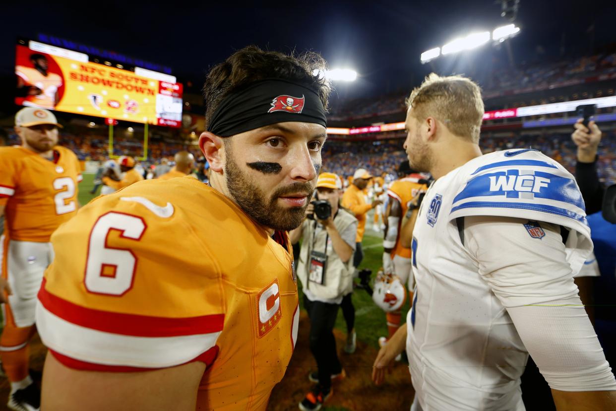Baker Mayfield of the Tampa Bay Buccaneers and Jared Goff of the Detroit Lions talk after Detroit's 20-6 win at Raymond James Stadium on October 15, 2023, in Tampa, Florida.