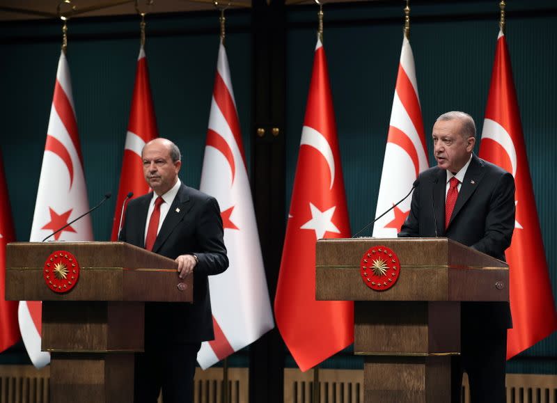 FILE PHOTO: Turkish President Erdogan and Turkish Cypriot leader Tatar attend a news conference in Ankara