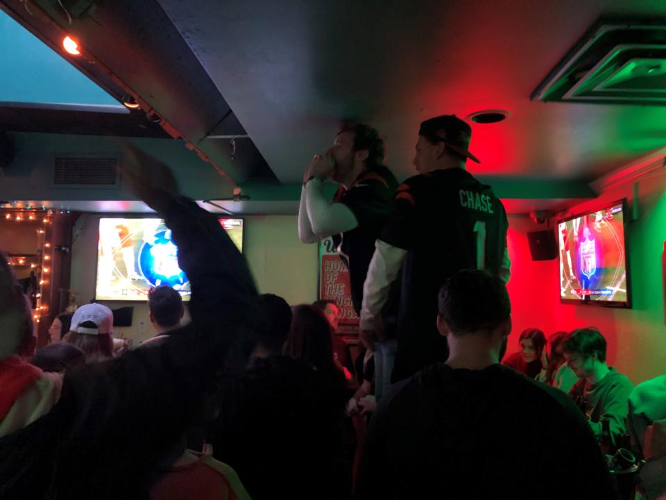 These fans at Woodie's Flat lead the Who Dey chant after the Bengals beat the Kansas City Chiefs Sunday, Dec. 4.