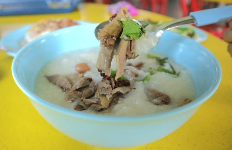 home treasure salted duck - closeup of duck with porridge