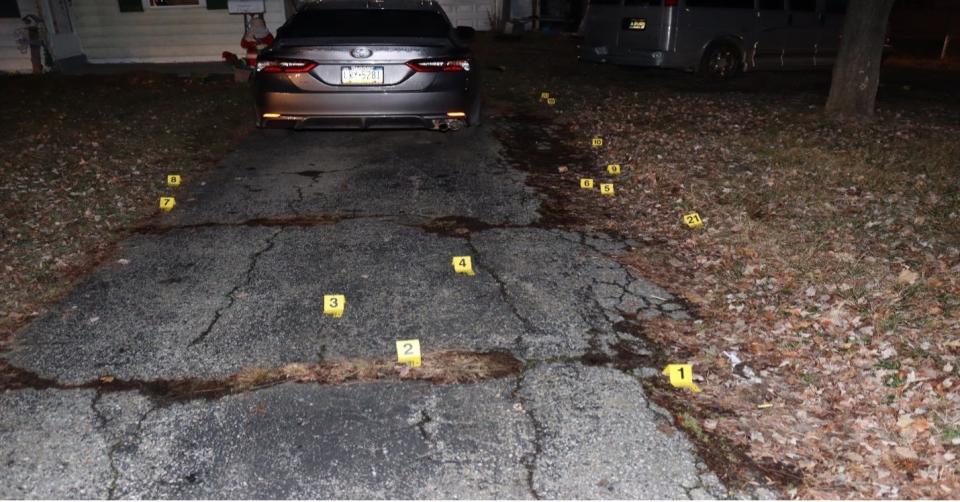 Flags mark the casings of bullets fired by Officer Sean Sweeney-Jones in a non-fatal officer-involved shooting near New Castle on Jan. 22, 2023.