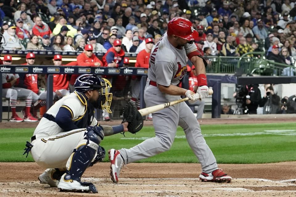 FILE - Milwaukee Brewers catcher Omar Narvaez is called for catchers interference as St. Louis Cardinals' Paul Goldschmidt hits during the third inning of a baseball game Thursday, April 14, 2022, in Milwaukee. The major leagues have seen a marked increase in catcher interference calls this season. Through Thursday's, June 29 big league games, there had been 57 catcher interference calls, up from 38 at the same point last year. (AP Photo/Morry Gash, File)
