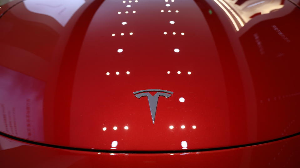 BEIJING, CHINA - OCTOBER 12: The Tesla logo is pictured at a Tesla showroom on October 12, 2020 in Beijing, China. (Photo by VCG/VCG via Getty Images)