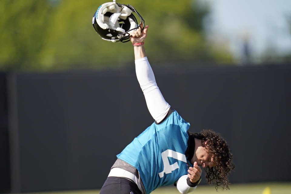 Jacksonville Jaguars place kicker Josh Lambo (4) loosens up before the start of an NFL football workout, Thursday, Aug. 13, 2020, in Jacksonville, Fla. (AP Photo/John Raoux)