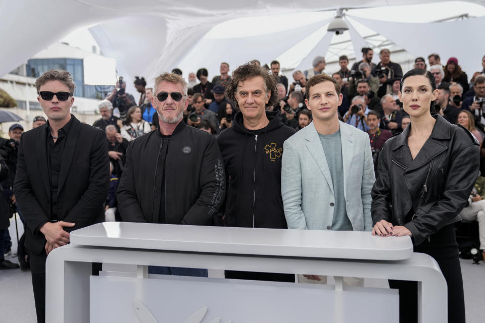 Michael Pitt, from left, Sean Penn, director Jean-Stephane Sauvaire, Tye Sheridan, and Raquel Nave pose for photographers at the photo call for the film 'Black Flies' at the 76th international film festival, Cannes, southern France, Friday, May 19, 2023. (Photo by Scott Garfitt/Invision/AP)