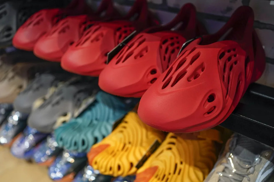 Yeezy shoes made by Adidas are displayed at Laced Up, a sneaker resale store, in Paramus, N.J., Tuesday, Oct. 25, 2022. Adidas has ended its partnership with the rapper formerly known as Kanye West over his offensive and antisemitic remarks, the latest company to cut ties with Ye and a decision that the German sportswear company said would hit its bottom line. (AP Photo/Seth Wenig)