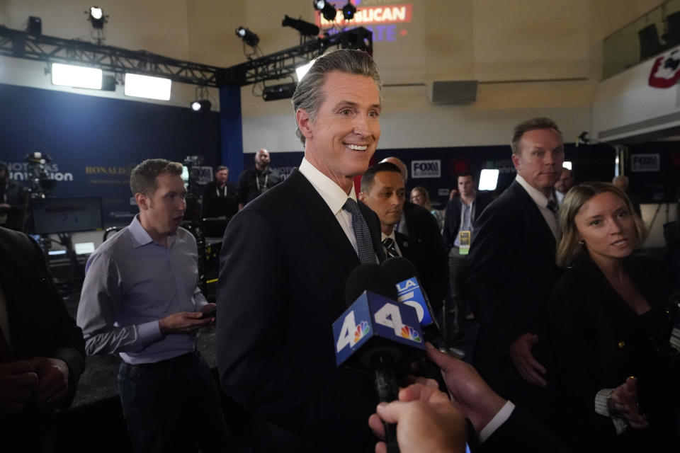 FILE - California Gov. Gavin Newsom fields questions on Sept. 27, 2023, at the Ronald Reagan Presidential Library in Simi Valley, Calif. Gov. Newsom begins a week-long trip to China on Monday, Oct. 23, 2023, where he'll meet with various Chinese officials to discuss climate policy and opportunities for collaboration. (AP Photo/Marcio Jose Sanchez, File)