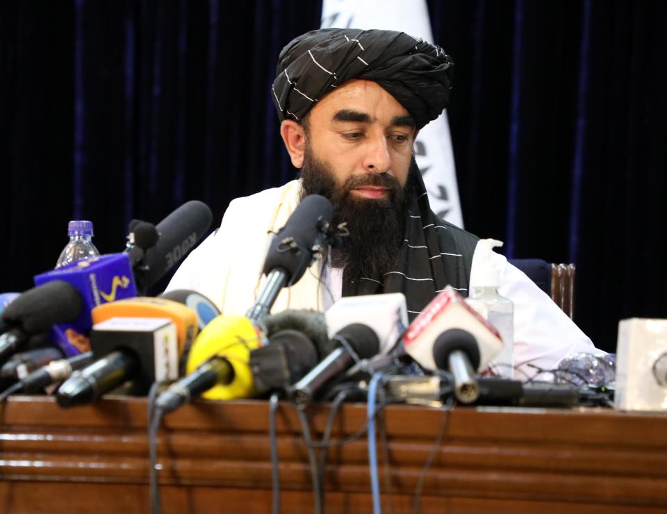KABUL, AFGHANISTAN - AUGUST 17: Taliban spokesperson Zabihullah Mujahid answers press members questions as he holds a press conference in Kabul, Afghanistan on August 17, 2021. (Photo by Sayed Khodaiberdi Sadat/Anadolu Agency via Getty Images)