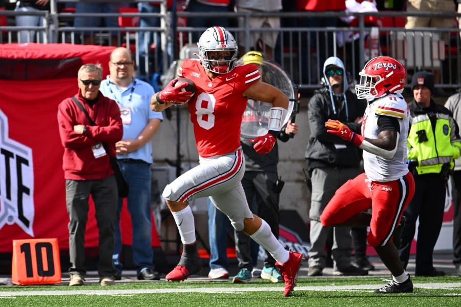 COLUMBUS, OHIO – OCTOBER 07: Cade Stover #8 of the Ohio State Buckeyes runs for a touchdown during the fourth quarter of a game against the Maryland Terrapins at Ohio Stadium on October 07, 2023 in Columbus, Ohio. (Photo by Ben Jackson/Getty Images)