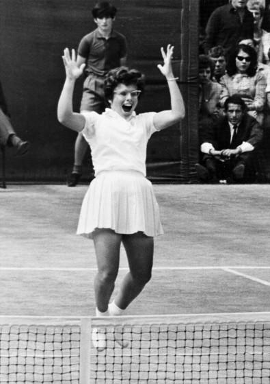 Billie Jean Moffitt King leaps for joy after her winning shot to clinch the Wimbledon singles title in London.