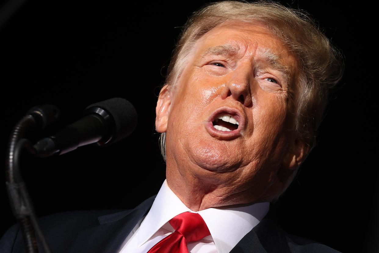 Former U.S. President Donald Trump addresses supporters during a 