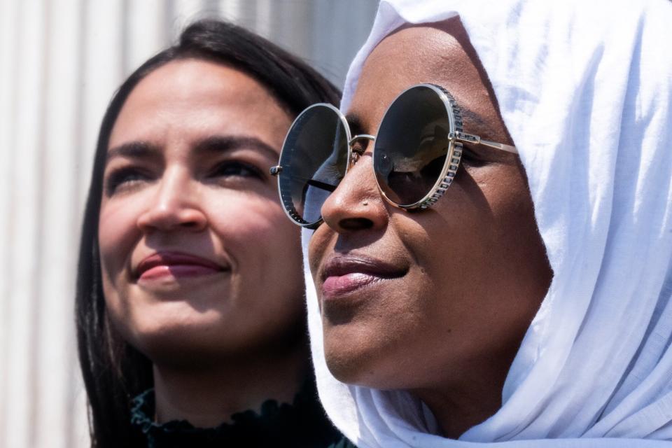 Rep. Ilhan Omar, D-Minn., right, and Rep. Alexandria Ocasio-Cortez, D-N.Y., attend a rally on the steps of the U.S. Capitol before the House voted on the Womens Health Protection Act and the Ensuring Womens Right to Reproductive Freedom Act, on Friday, July 15, 2022.