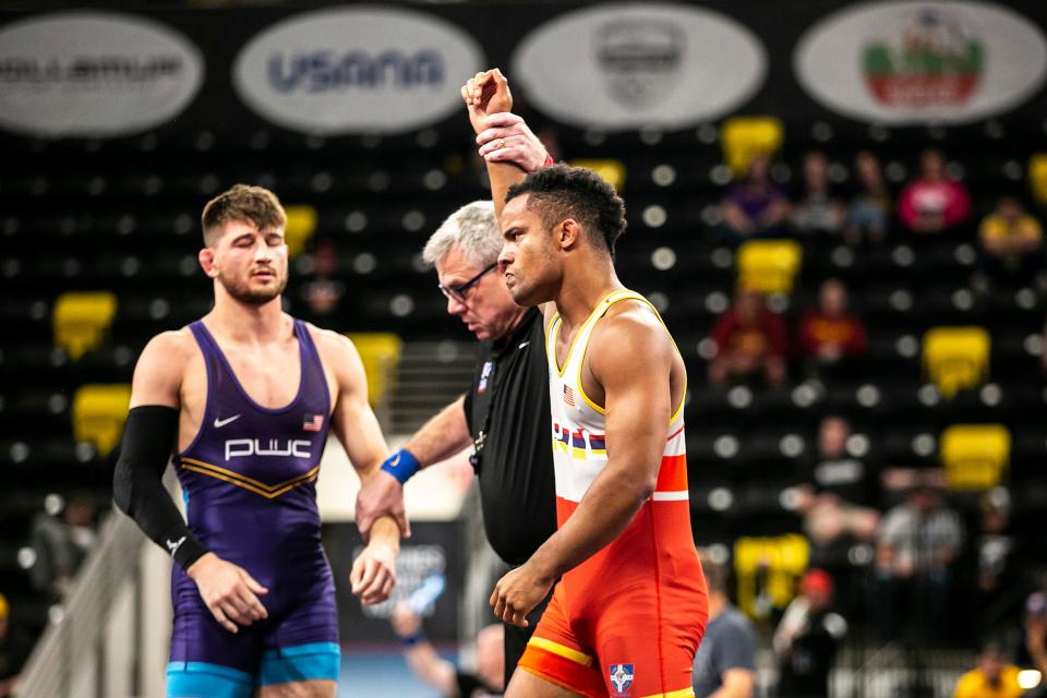 Mark Hall, right, has his hand raised after scoring a fall against Drew Foster at 86 kg during the second session of the USA Wrestling World Team Trials Challenge Tournament May 21 at Xtream Arena in Coralville.