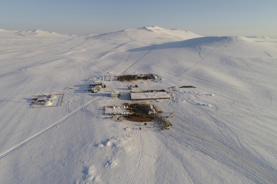 <p>Aerial view shows the nomad camp of farmer Tanzurun Darisyu in the Kara-Charyaa area south of Kyzyl town, the administrative center of the Republic of Tuva (Tyva region) in southern Siberia, Russia, on Feb. 14, 2018. (Photo: Ilya Naymushin/Reuters) </p>