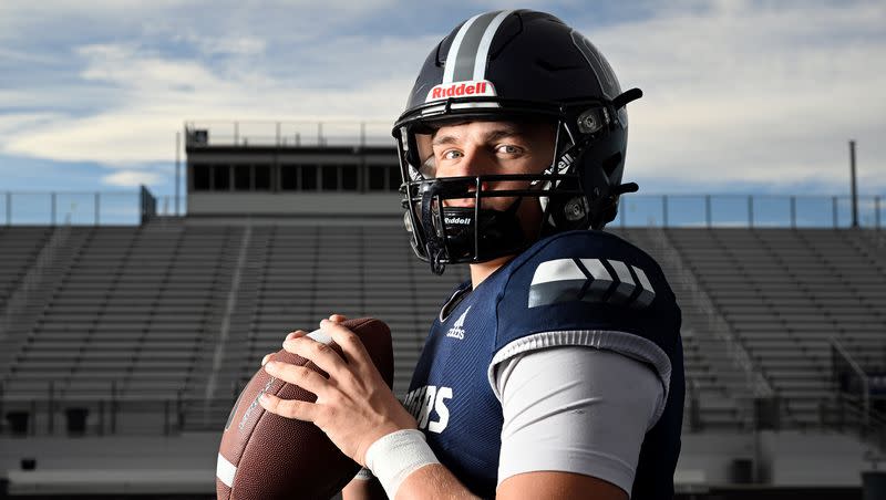 Corner Canyon’s Isaac Wilson poses for Mr. Football photos in Draper on Wednesday, Dec. 6, 2023. The high school standout committed to the Utes.